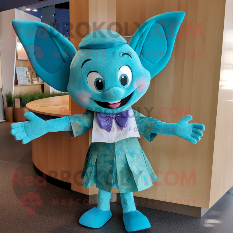 Teal Tooth Fairy mascot costume character dressed with a Cardigan and Bow ties