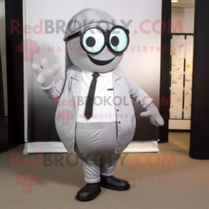 Silver Squash mascot costume character dressed with a Suit Pants and Eyeglasses