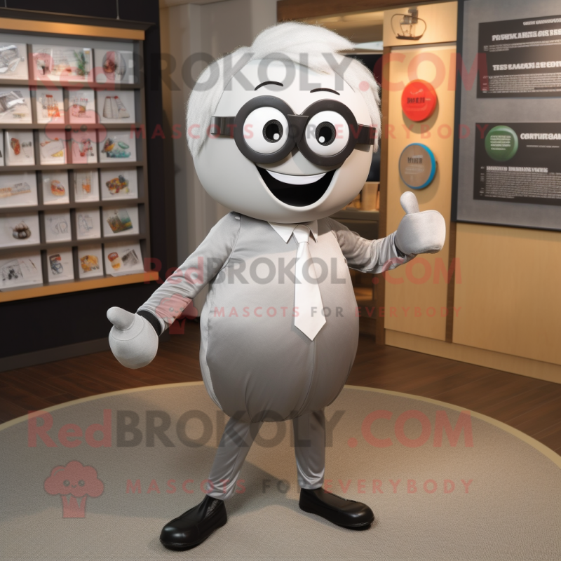 Silver Squash mascot costume character dressed with a Suit Pants and Eyeglasses