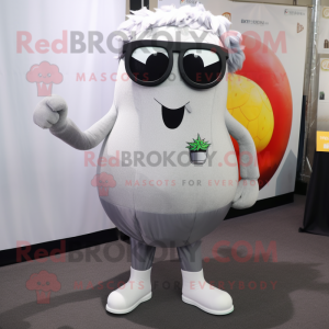 Silver Squash mascot costume character dressed with a Suit Pants and Eyeglasses