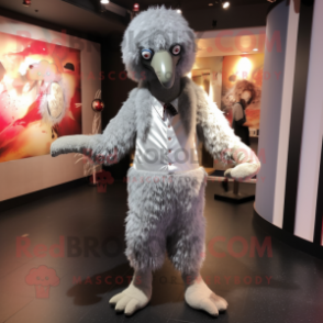 Silver Ostrich mascot costume character dressed with a Romper and Shoe clips