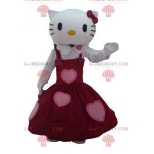 Maskot Hello Kitty oblečený v krásných červených šatech -