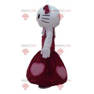 Hello Kitty maskot klädd i en vacker röd klänning -