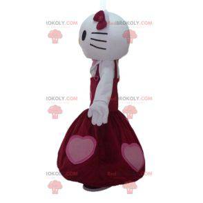 Maskotka Hello Kitty ubrana w piękną czerwoną sukienkę -