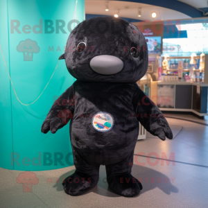 Black Stellar'S Sea Cow mascot costume character dressed with a Romper and Keychains