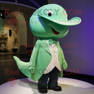 Green Whale mascot costume character dressed with a Blouse and Hat pins