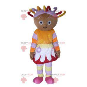 African girl mascot in colorful outfit with dreads -