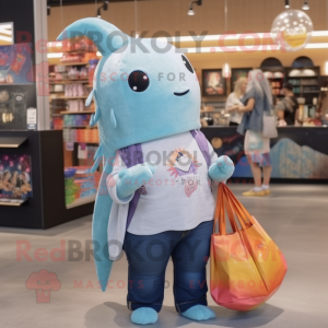 Silver Narwhal mascot costume character dressed with a Flare Jeans and Tote bags