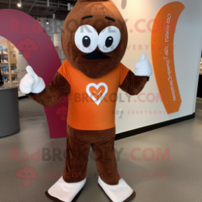 Rust Arrow Of Love mascot costume character dressed with a Yoga Pants and Mittens