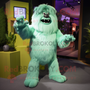 Green Yeti mascot costume character dressed with a Romper and Bow ties