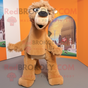 Tan Camel mascot costume character dressed with a Graphic Tee and Hair clips