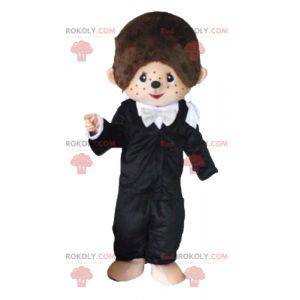 Kiki mascot the famous brown monkey in black outfit -