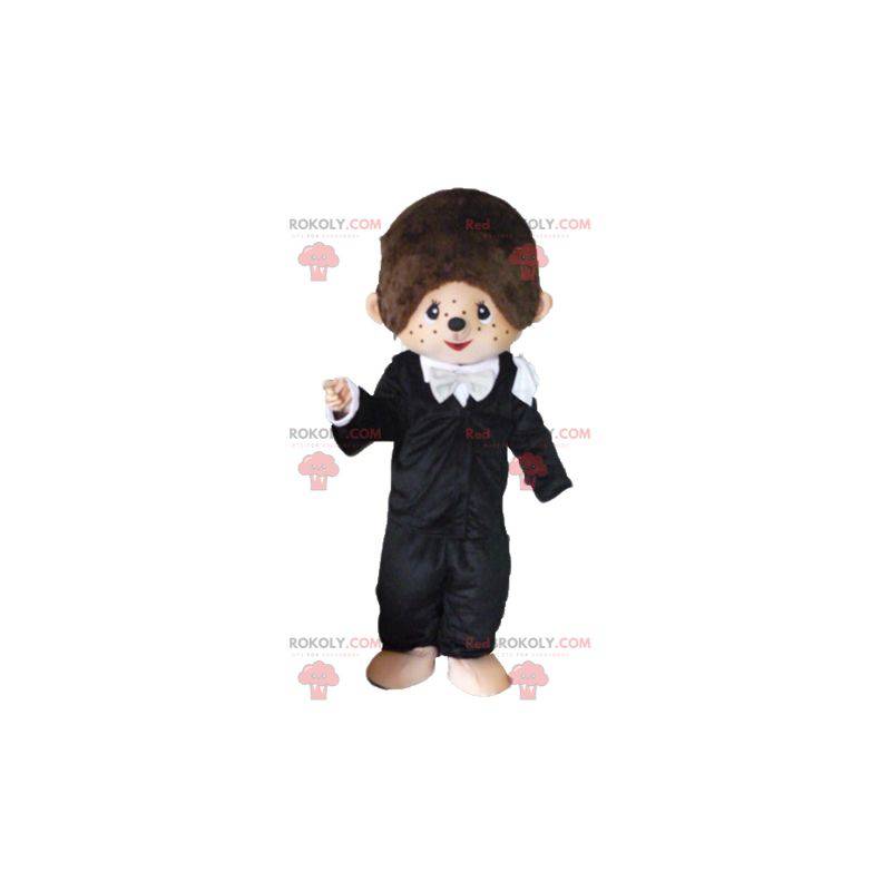 Mascotte de Kiki le célèbre singe marron en tenue noire -