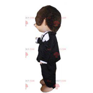 Kiki mascot the famous brown monkey in black outfit -