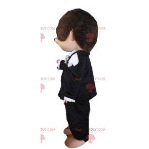 Kiki mascot the famous brown monkey in black outfit -