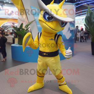 Yellow Swordfish mascot costume character dressed with a Skinny Jeans and Rings