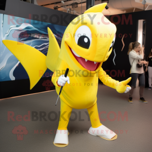 Yellow Swordfish mascot costume character dressed with a Skinny Jeans and Rings