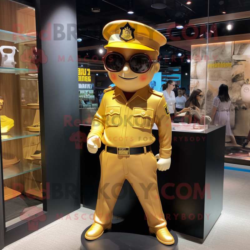 Gold Police Officer mascot costume character dressed with a Suit Pants and Eyeglasses