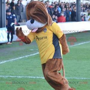 Brown dog mascot with a yellow t-shirt - Redbrokoly.com