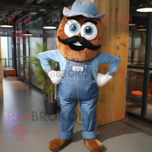 Rust Candy mascot costume character dressed with a Denim Shirt and Suspenders