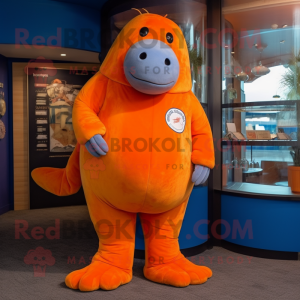 Orange Stellar'S Sea Cow mascot costume character dressed with a Trousers and Ties