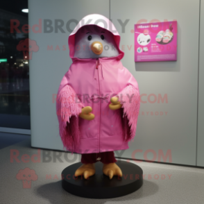 Pink Kiwi mascot costume character dressed with a Raincoat and Shawl pins