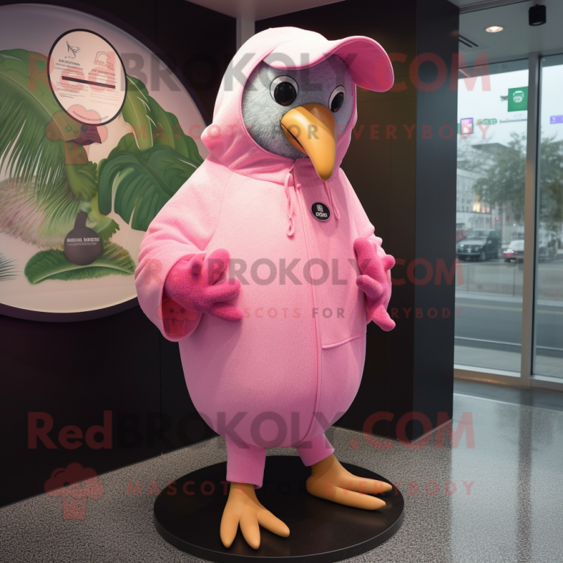 Pink Kiwi mascot costume character dressed with a Raincoat and Shawl pins Pink Kiwi mascot costume character dressed with a Raincoat and Shawl pins