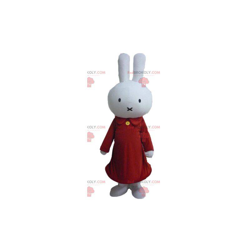 Mascota de conejo blanco de peluche vestida de rojo -