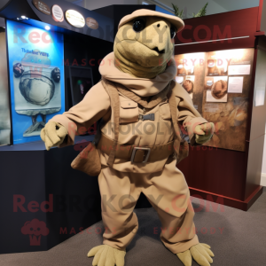 Tan Turtle mascot costume character dressed with a Cargo Pants and Shawl pins