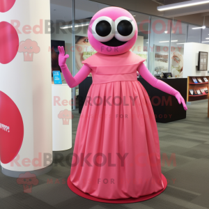 Pink Cyclops mascot costume character dressed with a Maxi Skirt and Rings