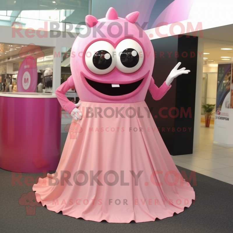Pink Cyclops mascot costume character dressed with a Maxi Skirt and Rings Pink Cyclops mascot costume character dressed with a Maxi Skirt and Rings