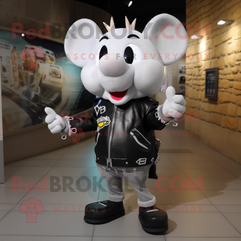 Silver Ray mascot costume character dressed with a Biker Jacket and Handbags Silver Ray mascot costume character dressed with a Biker Jacket and Handbags