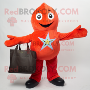 Red Starfish mascot costume character dressed with a Jacket and Tote bags