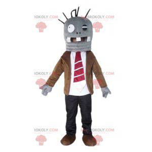 Mascote monstro cinza muito divertido de terno e gravata -