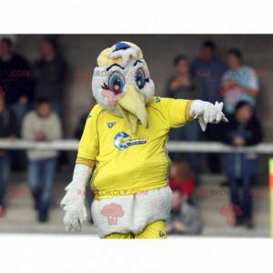 Mascota de la cigüeña gaviota blanca en ropa deportiva amarilla