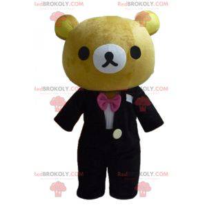 Mascot big brown teddy bear dressed in a pretty black costume -