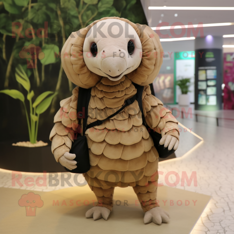 Beige Pangolin mascot costume character dressed with a Mini Dress and Backpacks Beige Pangolin mascot costume character dressed with a Mini Dress and Backpacks