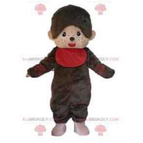Mascota de Kiki el famoso mono marrón con un babero rojo -