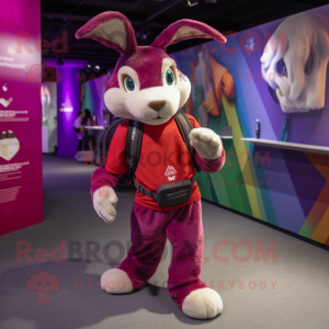 Magenta Wild Rabbit mascot costume character dressed with a V-Neck Tee and Backpacks