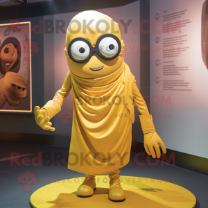 Gold Cyclops mascot costume character dressed with a Wrap Skirt and Eyeglasses