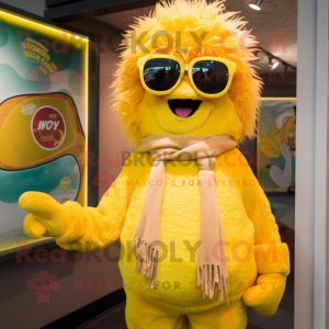 Yellow Raspberry mascot costume character dressed with a Cover-up and Sunglasses