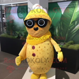 Yellow Raspberry mascot costume character dressed with a Cover-up and Sunglasses