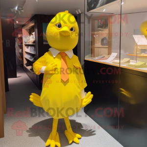 Yellow Dove mascot costume character dressed with a Mini Dress and Cufflinks