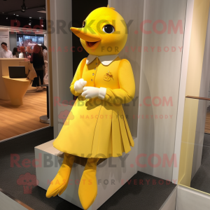 Yellow Dove mascot costume character dressed with a Mini Dress and Cufflinks