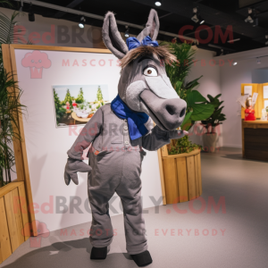 nan Donkey mascot costume character dressed with a Jumpsuit and Tie pins