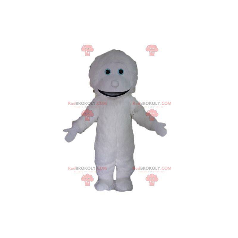 Mascote gigante e sorridente do monstro branco yeti -