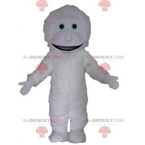 Mascote gigante e sorridente do monstro branco yeti -