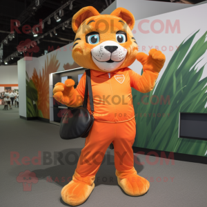 Orange Puma mascot costume character dressed with a Playsuit and Handbags