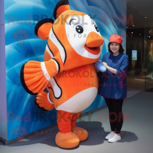 Navy Clown Fish mascot costume character dressed with a Leggings and Clutch bags