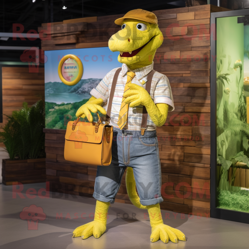 Yellow Crocodile mascot costume character dressed with a Chambray Shirt and Wallets